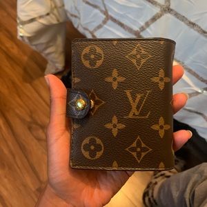 Louis Vuitton wallet.